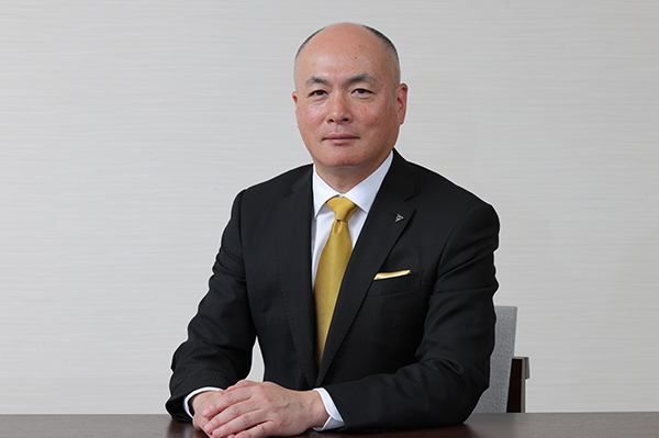 写真：代表取締役社長　國安恭彰