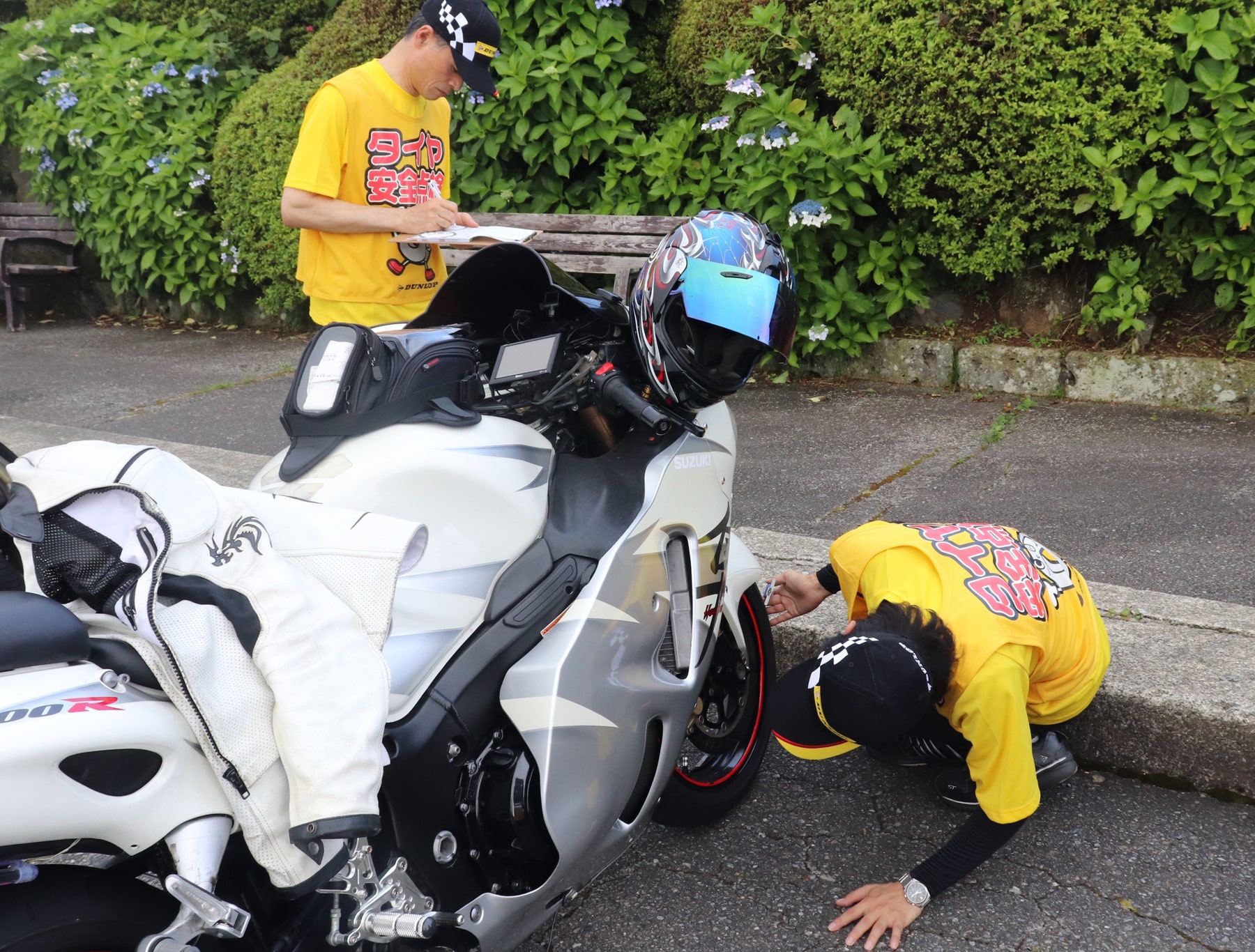 Staff conducting tire safety inspections as part of an inspection campaign conducted in August 2019